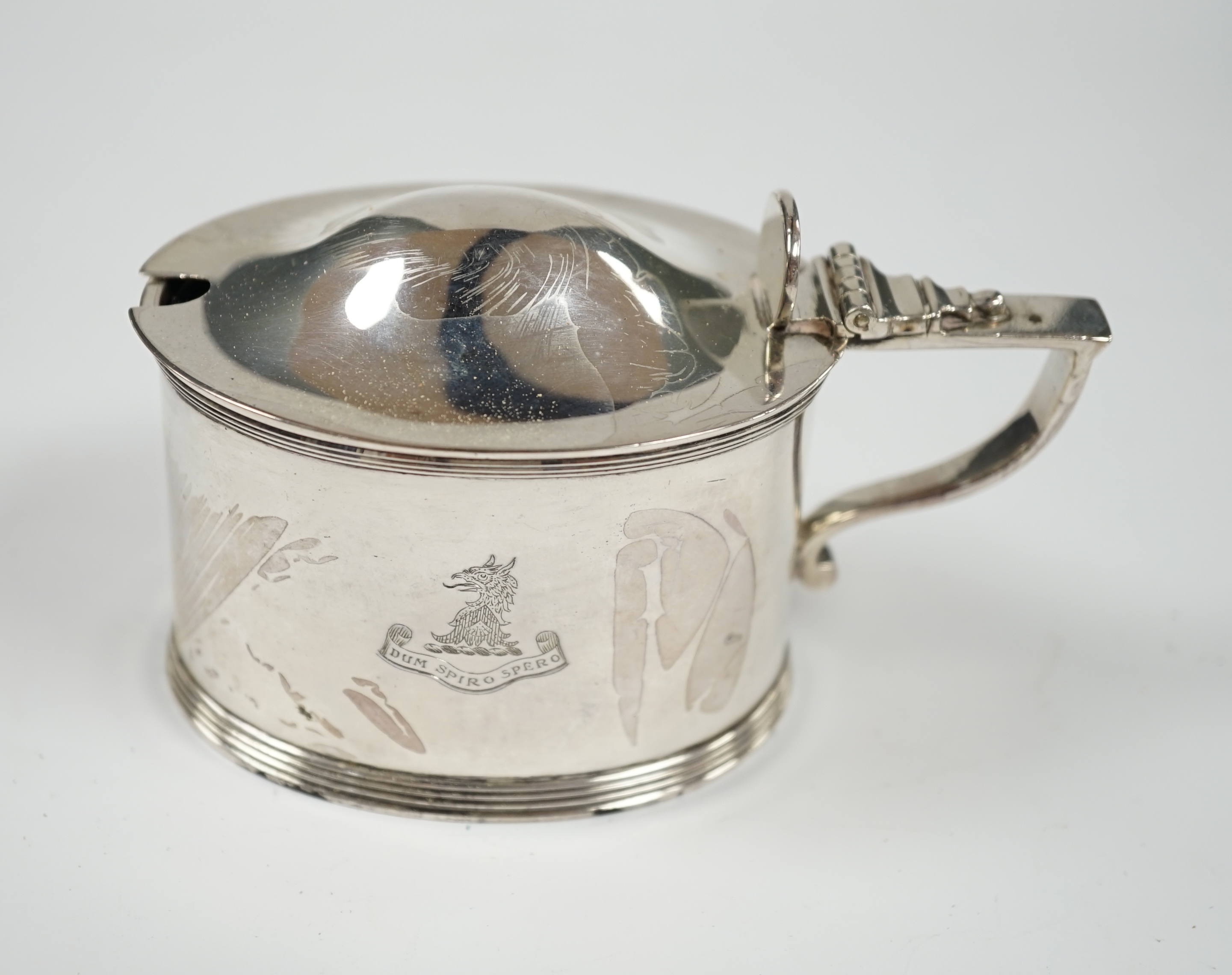 A late Victorian silver oval mustard pot, by William Barnard & Sons, London, 1881, length 10.5cm. Condition - fair